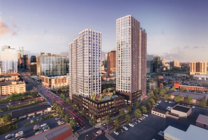 Aerial rendering of The Motley's twin towers rising over Midtown Nashville