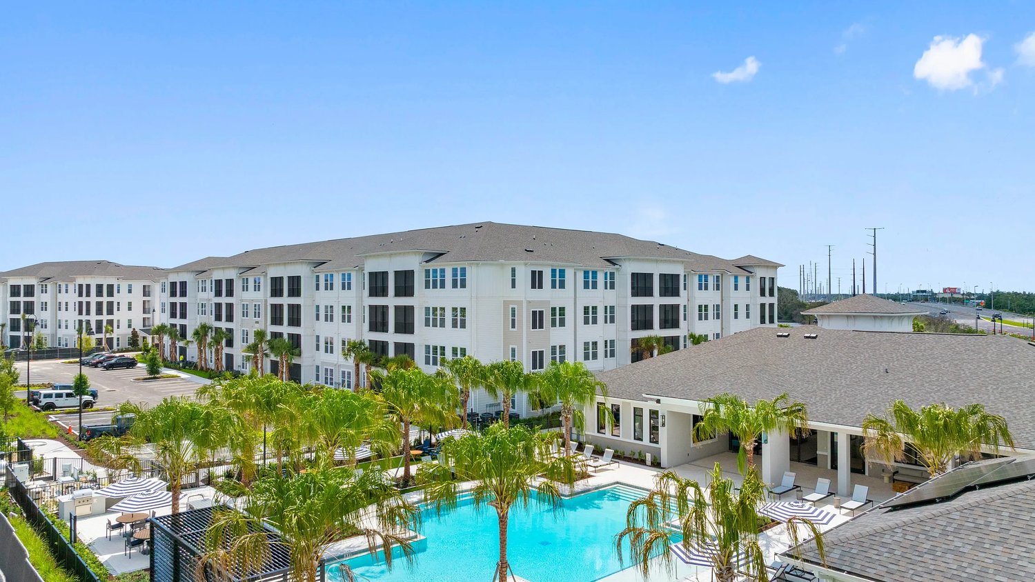 Completed residence building and pool at Caroline Anclote Harbor