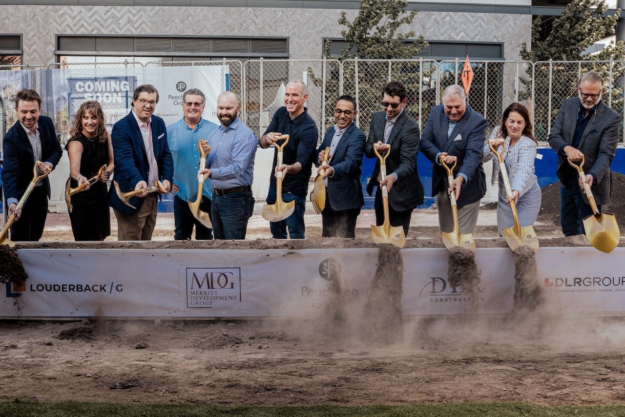 Groundbreaking ceremony for the Hilton dual-brand hotel with Merritt Development Group, DLR Group, and project partners