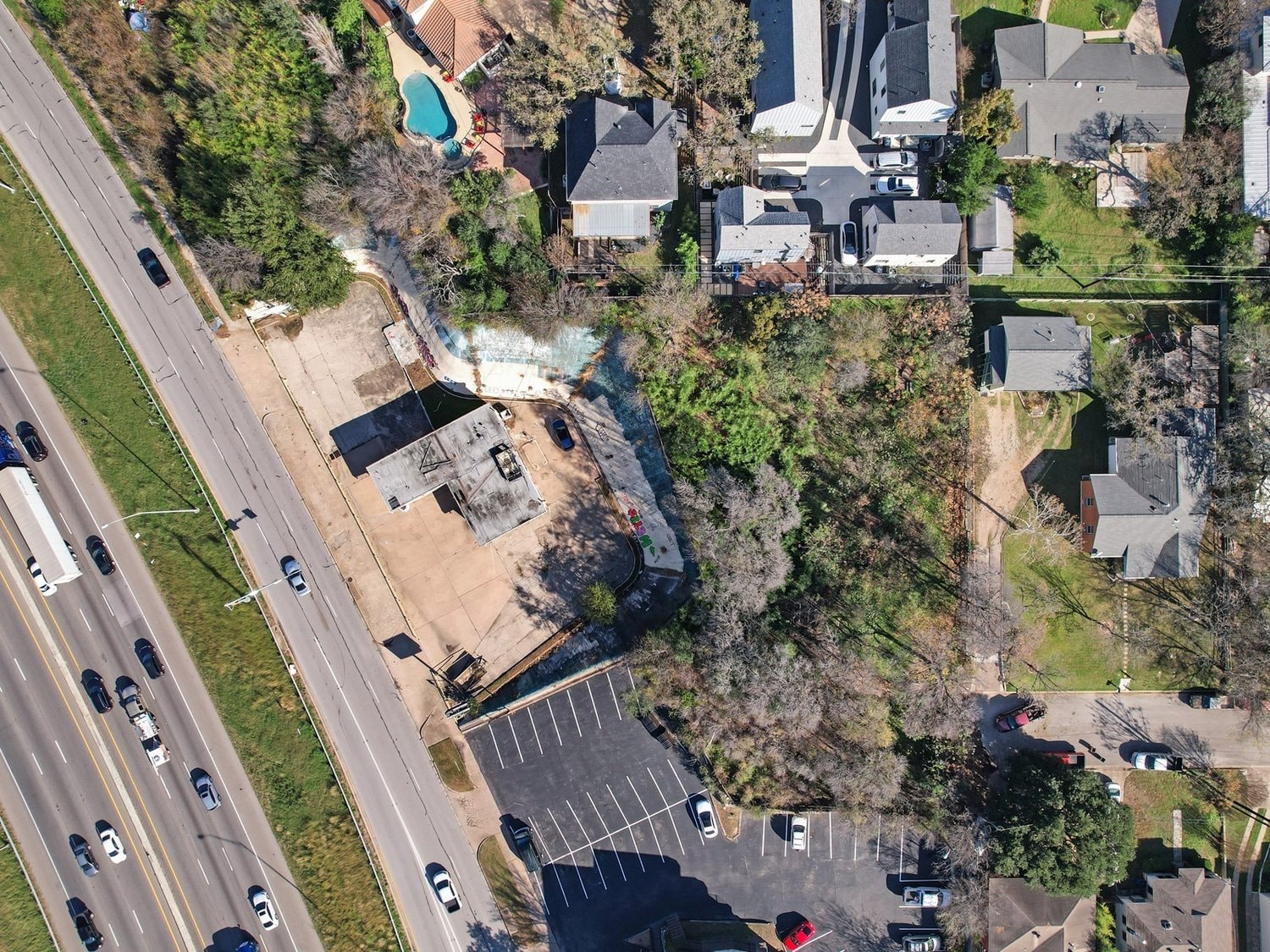 Aerial view of the 1221 S IH-35 site along the northbound frontage road, proposed for mixed-use rezoning