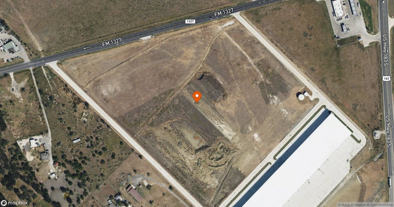 Site of Mustang Ridge Distribution Center I (Tesla Lease) at 6925 FM 1327, Mustang Ridge, TX 78747
