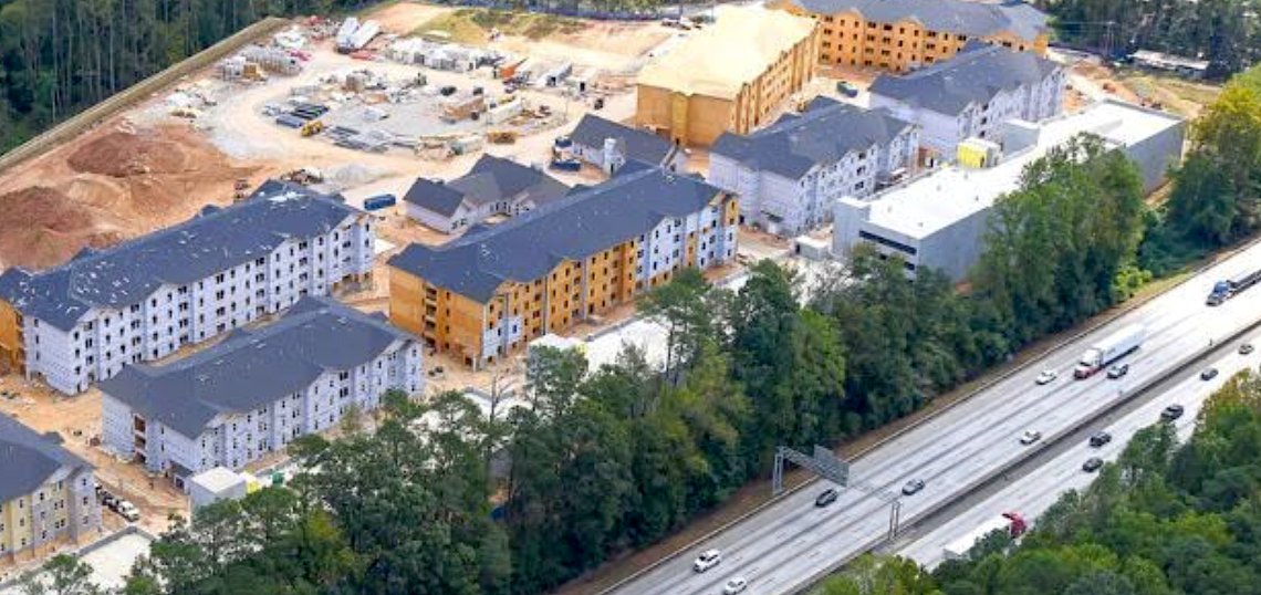 Construction progress at The Flats and Villas at Stone Hogan, which delivered 450 homes ahead of schedule