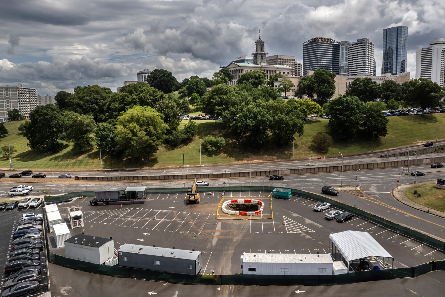 Early site work for The Boring Company's Music City Loop in downtown Nashville, with the State Capitol in the background