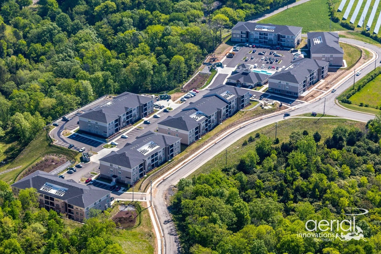 Aerial view of Skyline Ridge Apartments showing the clubhouse and pool