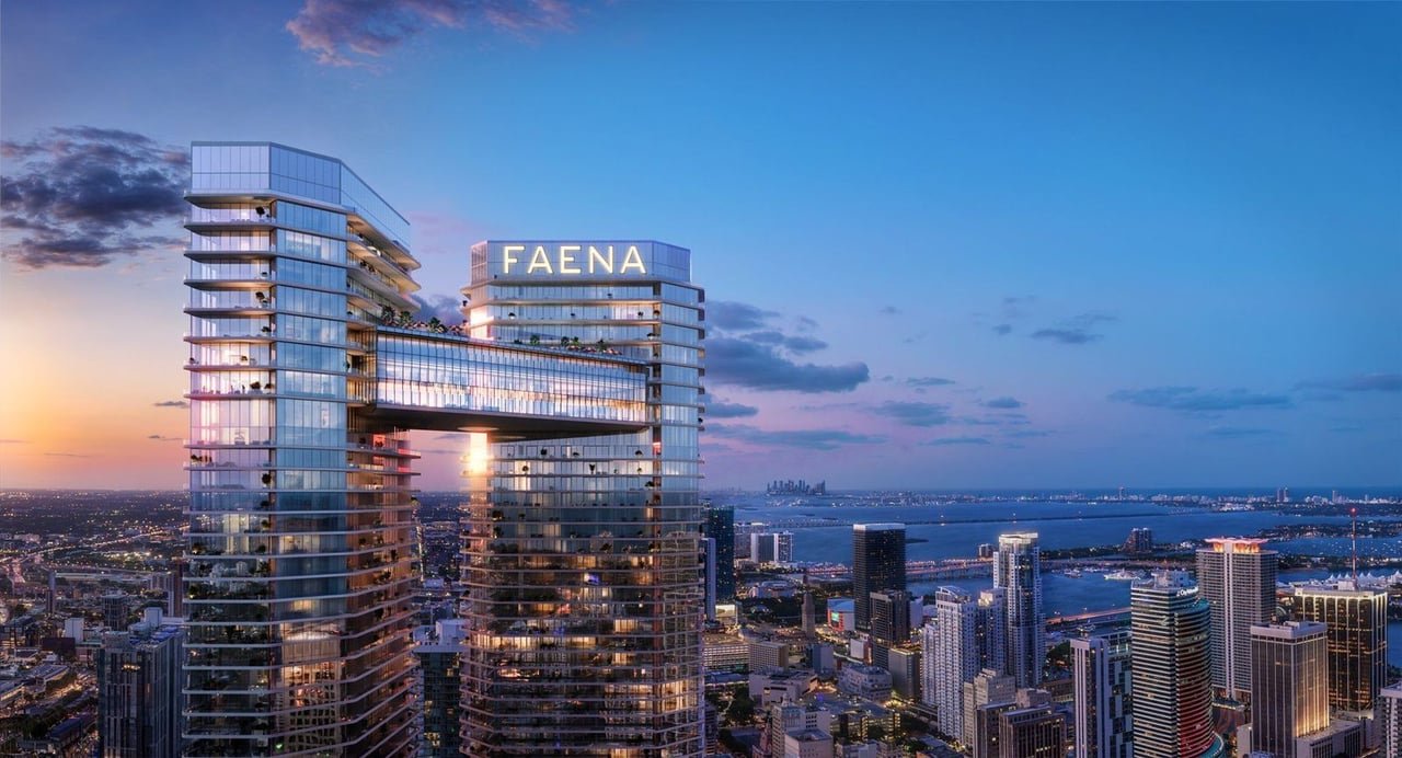 Aerial rendering of Faena Residences Miami with its sky bridge and downtown Miami backdrop