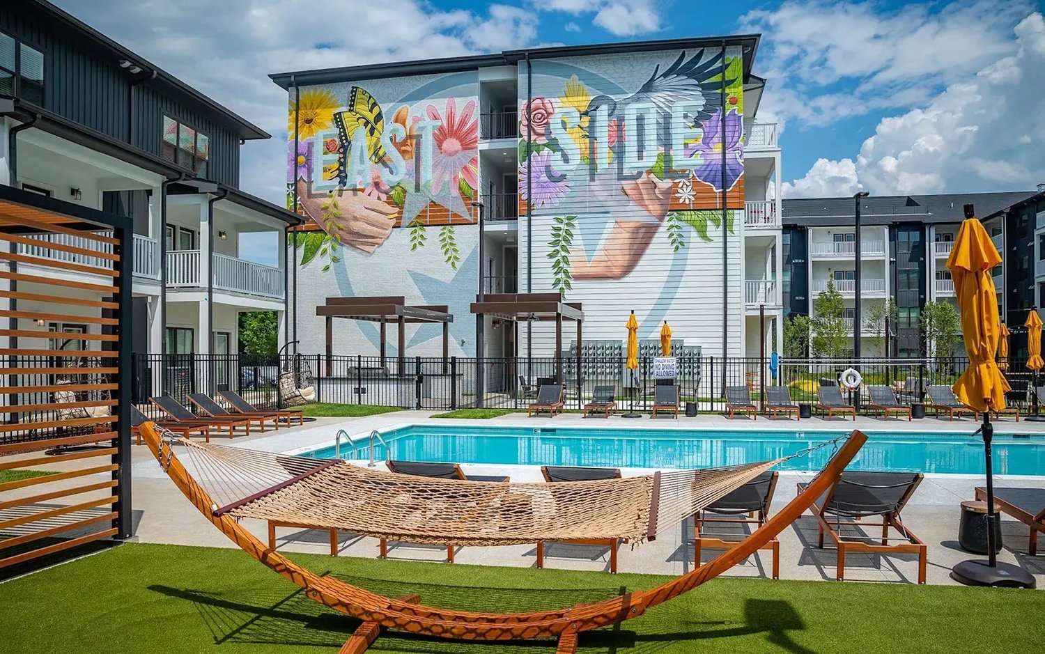 Pool courtyard and mural at The Flats at Laurel & Pine in East Nashville