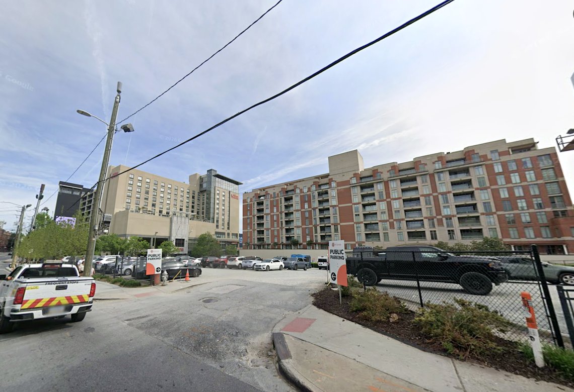 Street-level view of the existing surface parking lot at 289 Marietta Street NW